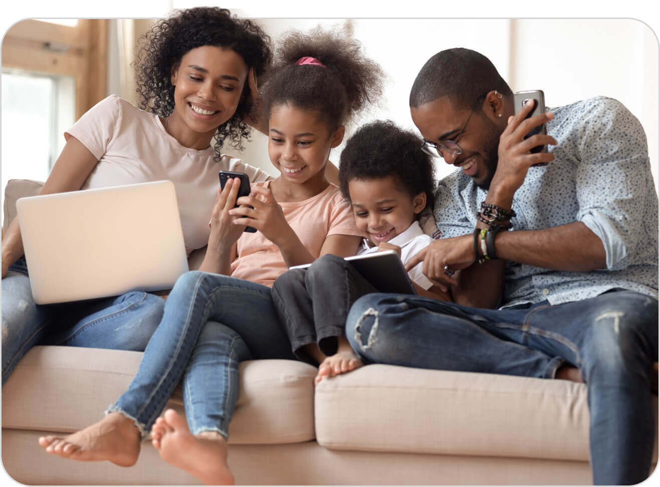 Family playing mobile games together